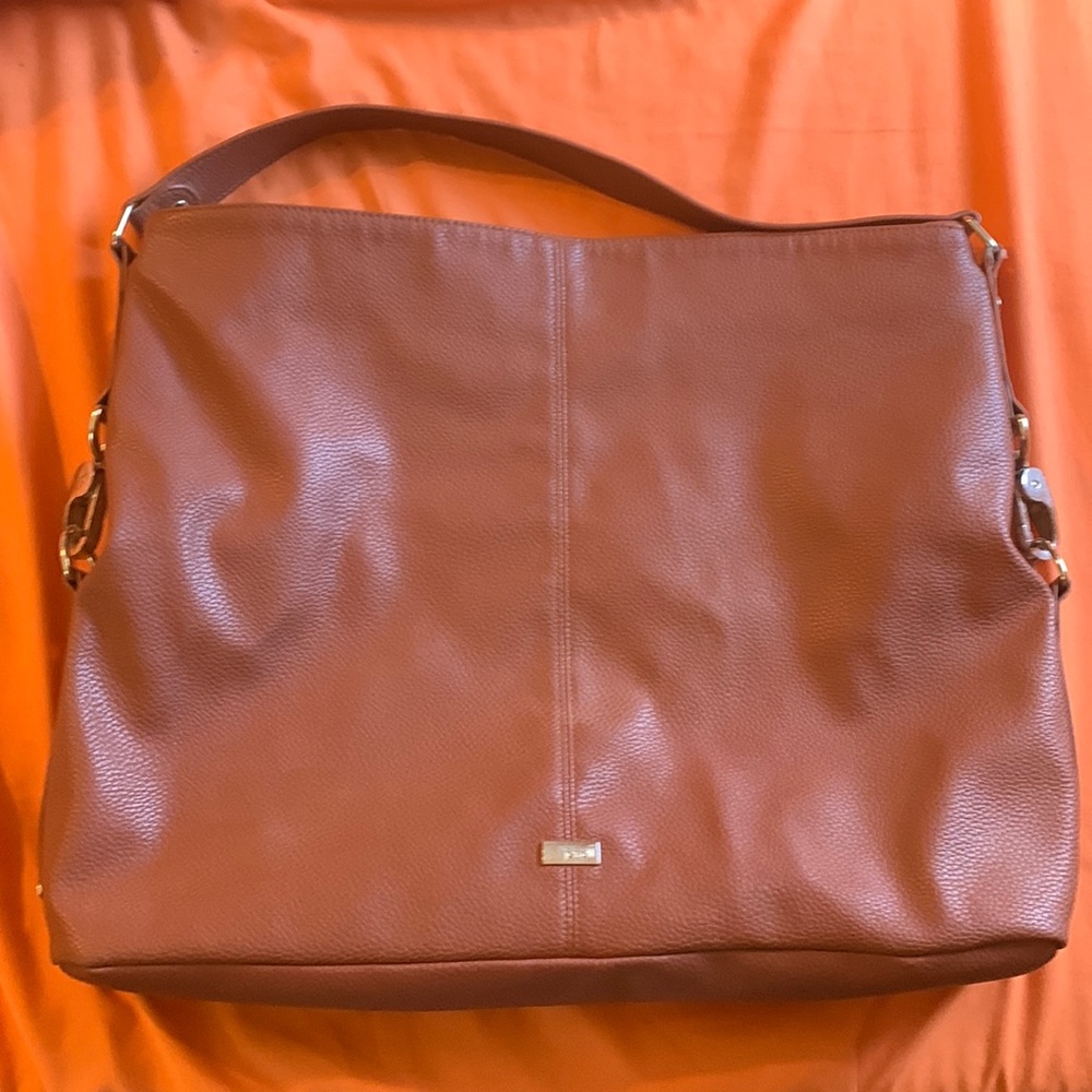 Large brown leather Jewel by Thirty one bag.